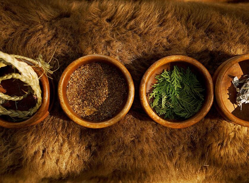 photo of four bowls of indigenous medicines